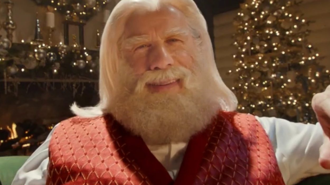 John Travolta Is Totally Unrecognizable as Santa Claus in Capital One Ad