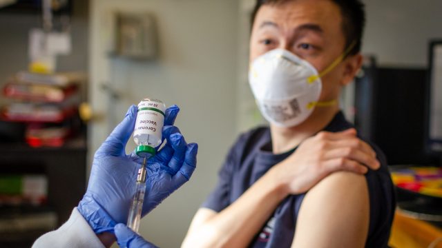 male getting vaccinated against coronavirus