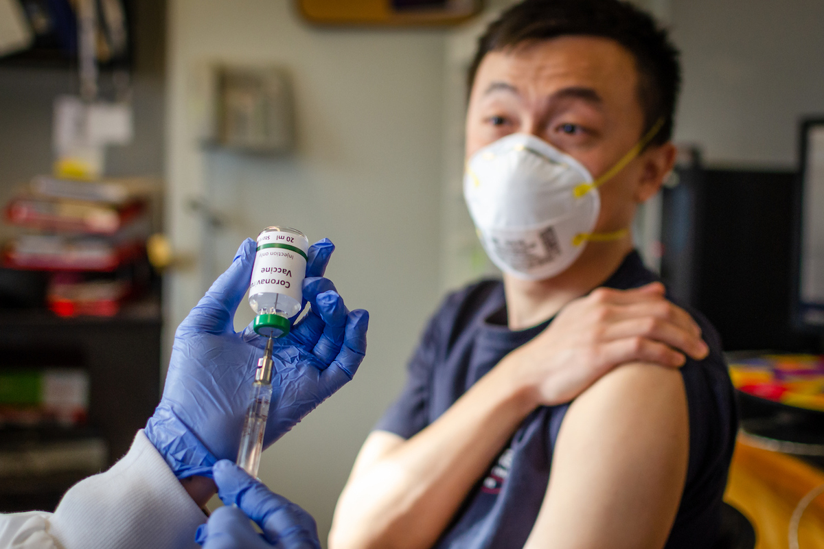 Man getting vaccinated against coronavirus