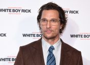 matthew mcconaughey in brown suit in front of step and repeat