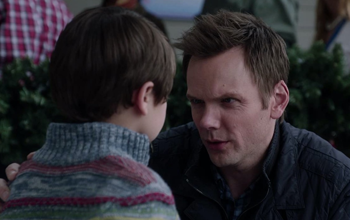 joel mchale and young child movie still