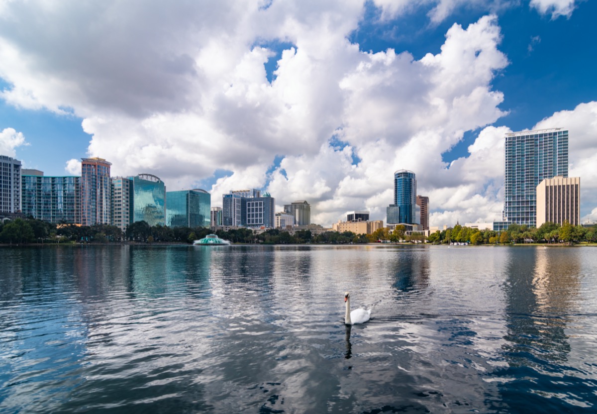 Lake Eola Park in and city skyline of downtown Orlando, Flordia