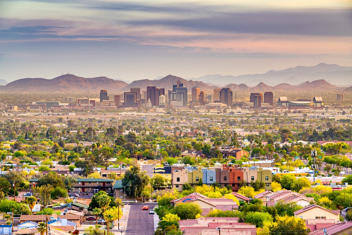 cityscape photo of homes, buildings, and mountains in Phoenix, Arizona