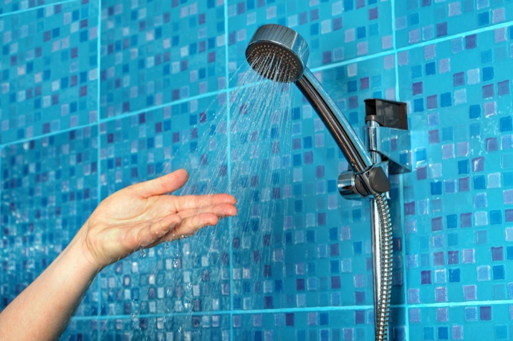 Checking the water in shower
