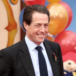 hugh grant on the red carpet