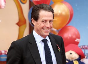 hugh grant on the red carpet