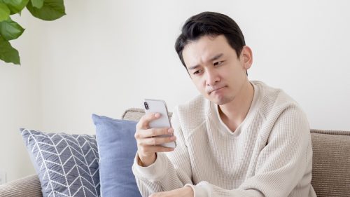 Man deleting pictures of her ex from social media to help her move on