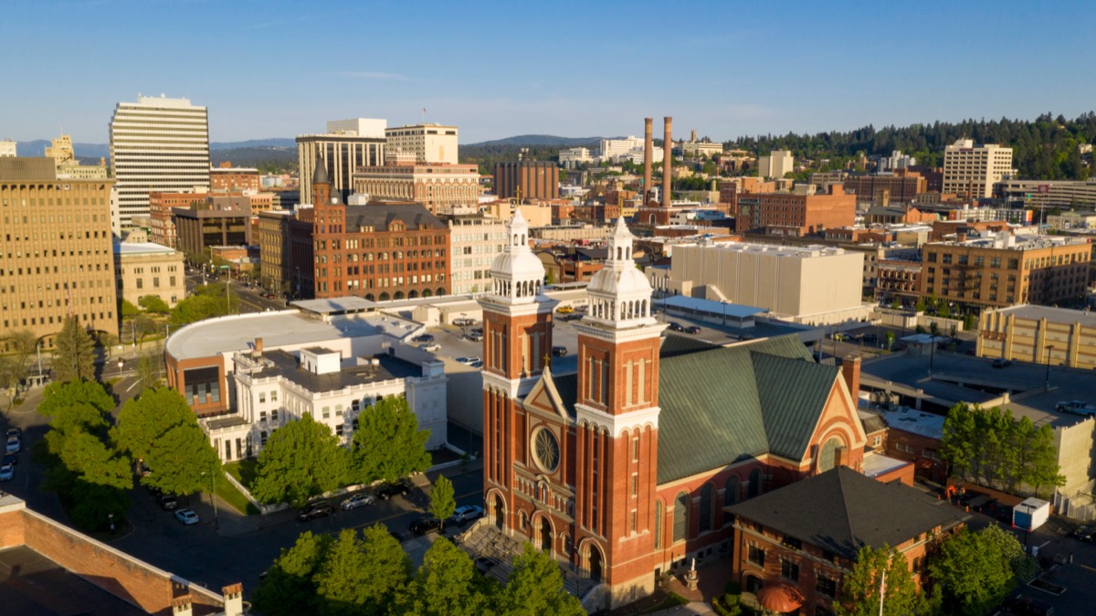 cityscape photo of a church, buildings, and trees in Spokane, Washington