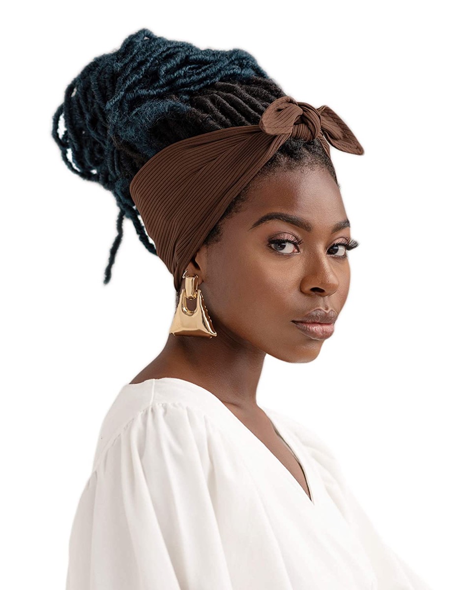 young black woman wearing brown hair wrap