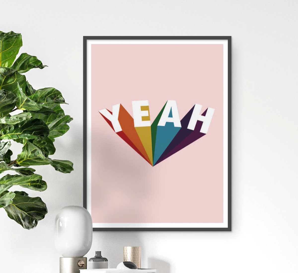 print with the word yeah in rainbow letters
