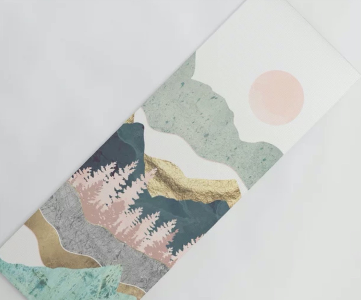 yoga mat with mountain and sun pattern