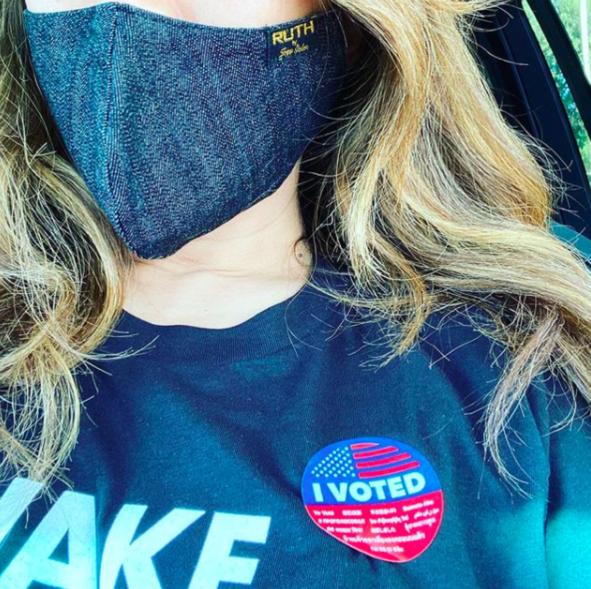 Carrie Ann Inaba wearing a mask to vote