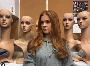 Isla Fisher with mannequin heads