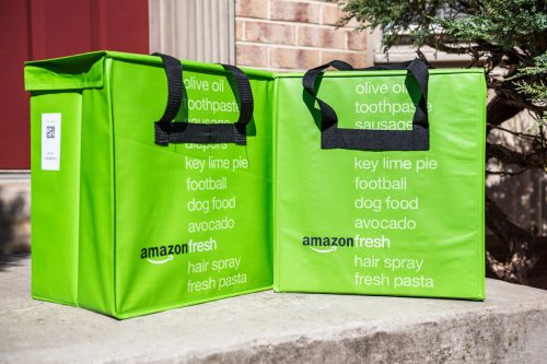 Amazon Fresh insulated grocery delivery bags on front porch closeup
