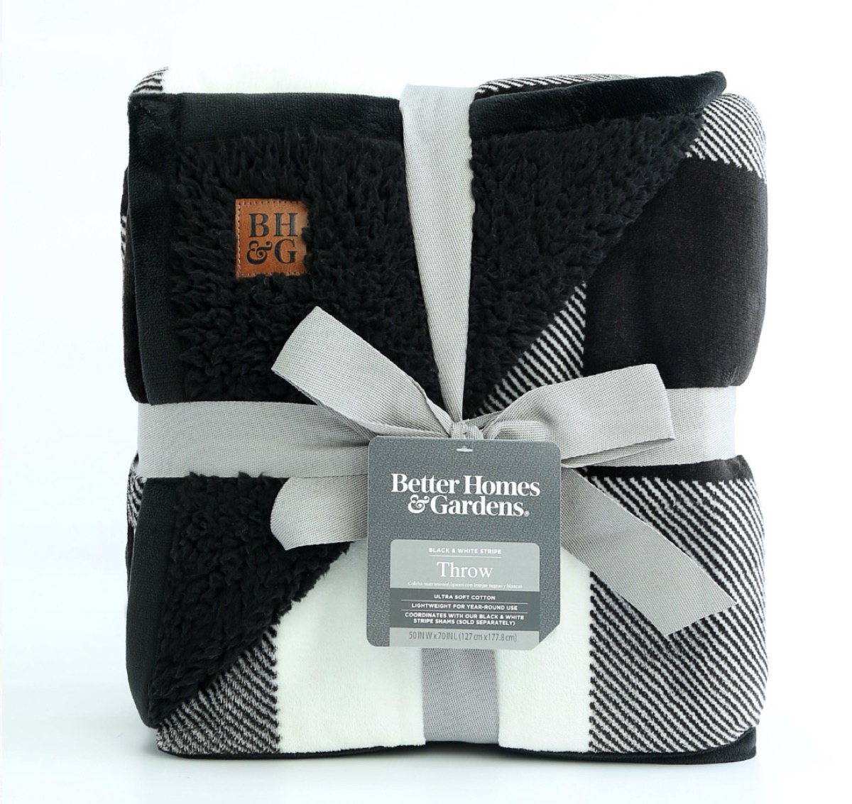 black and white blanket tied with gray bow