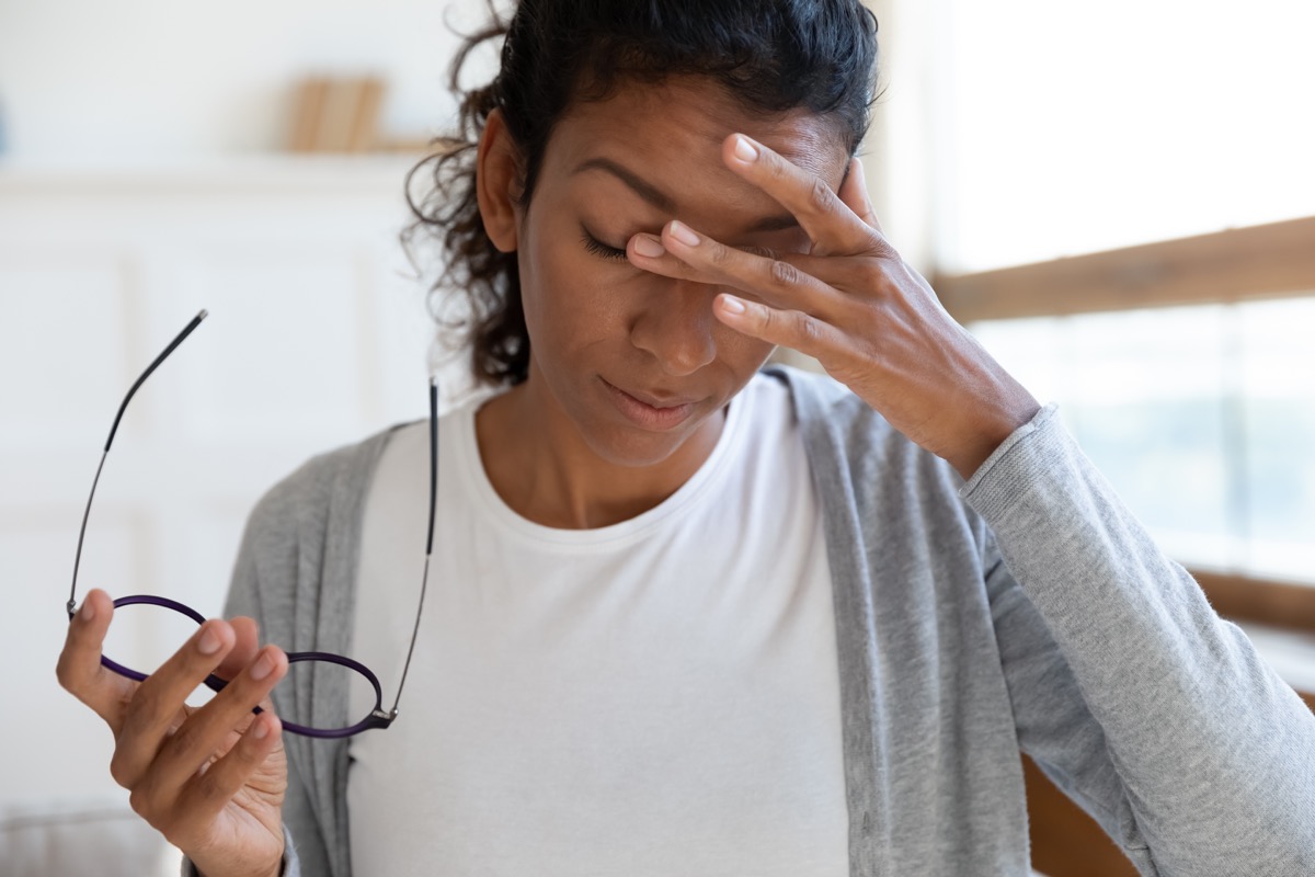 Woman experiencing dizziness