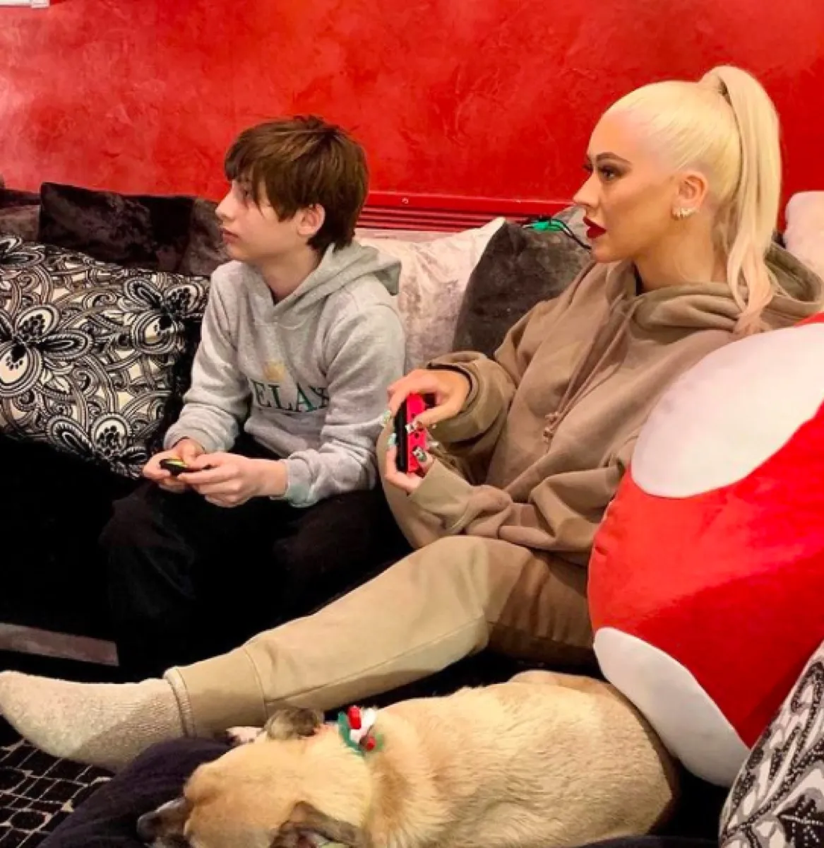 Christina Aguilera gaming with son