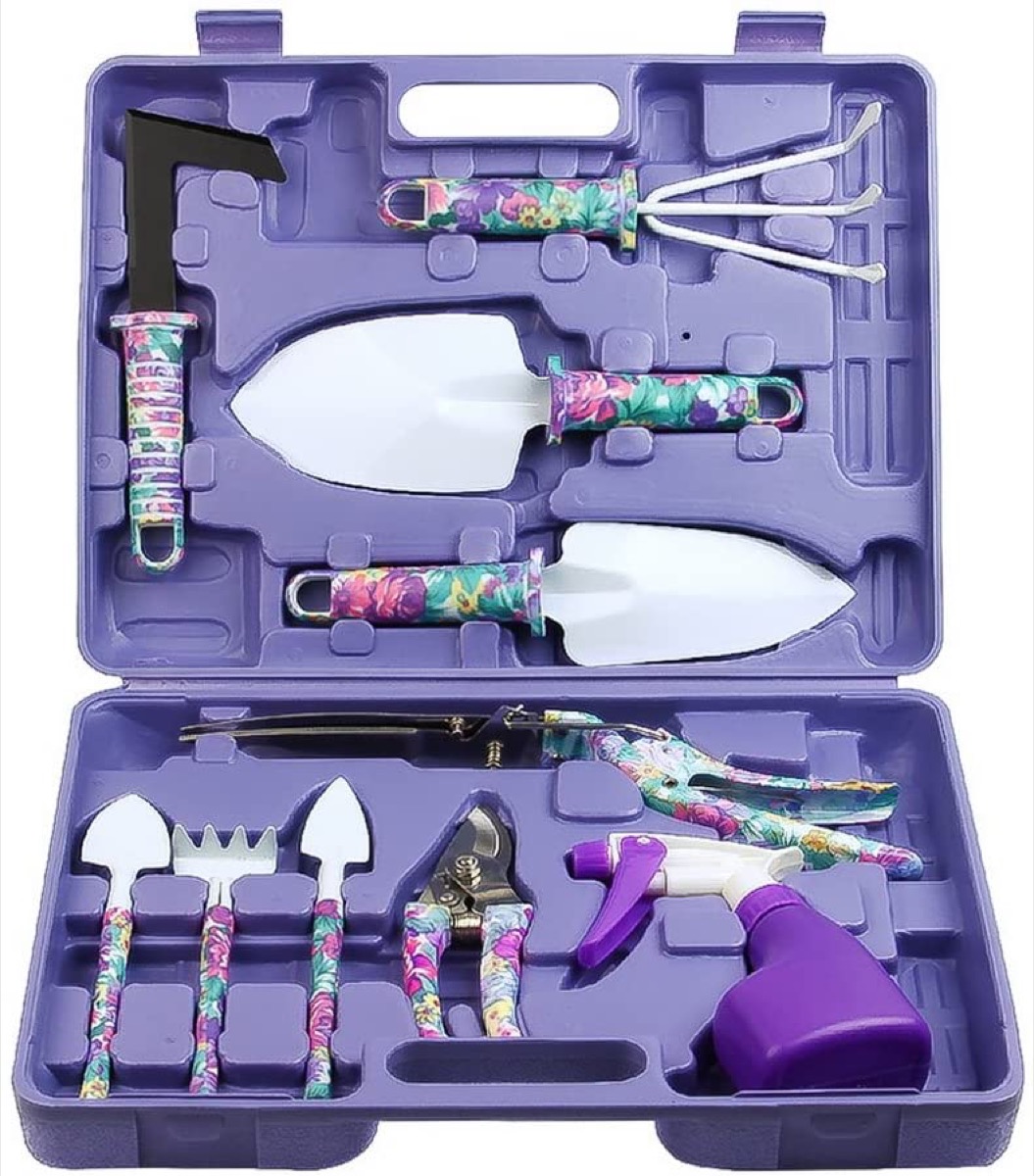 purple case full of floral patterned gardening tools