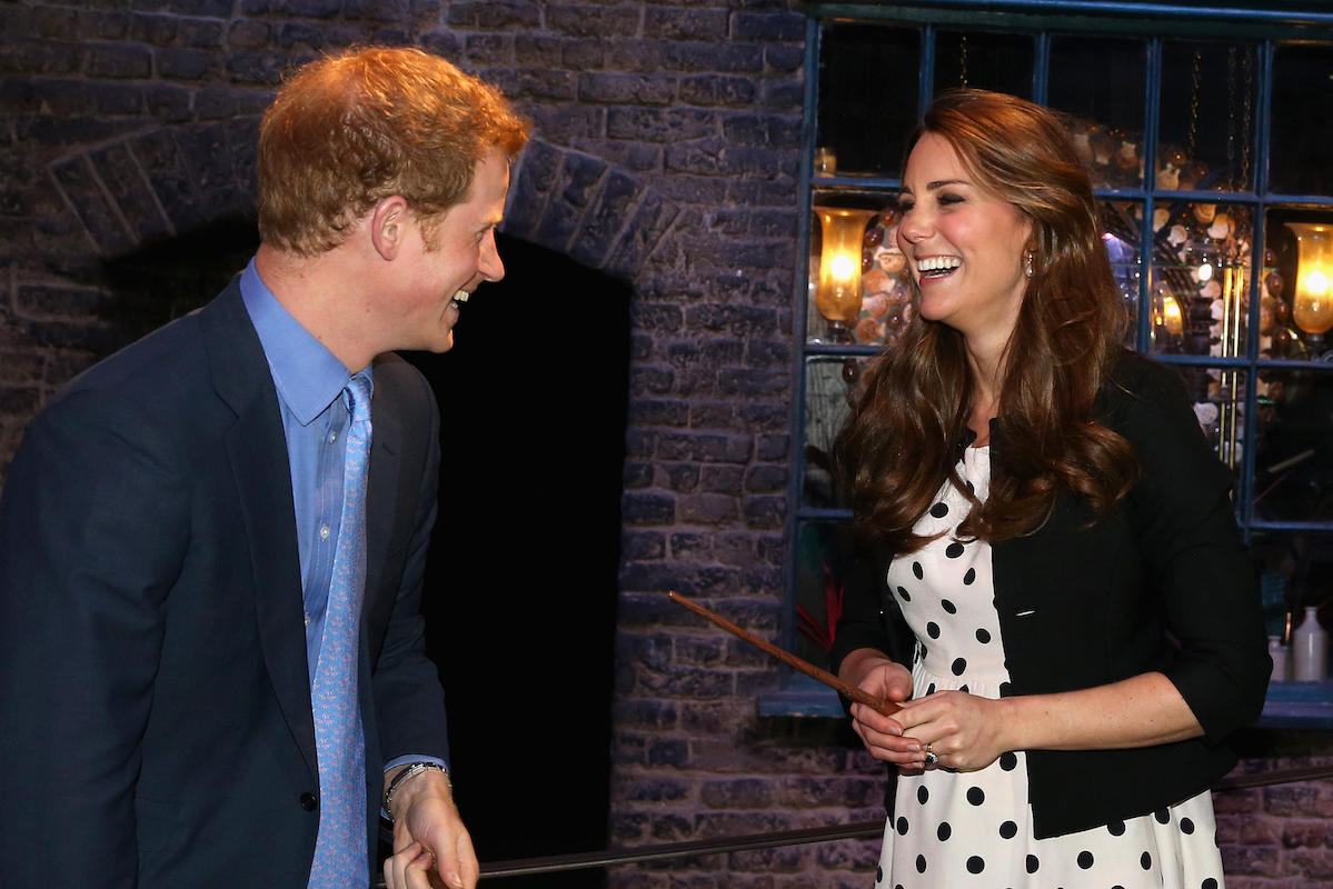 Catherine, Duchess of Cambridge and Prince Harry, attend the inauguration of Warner Bros. Studios in April 2013