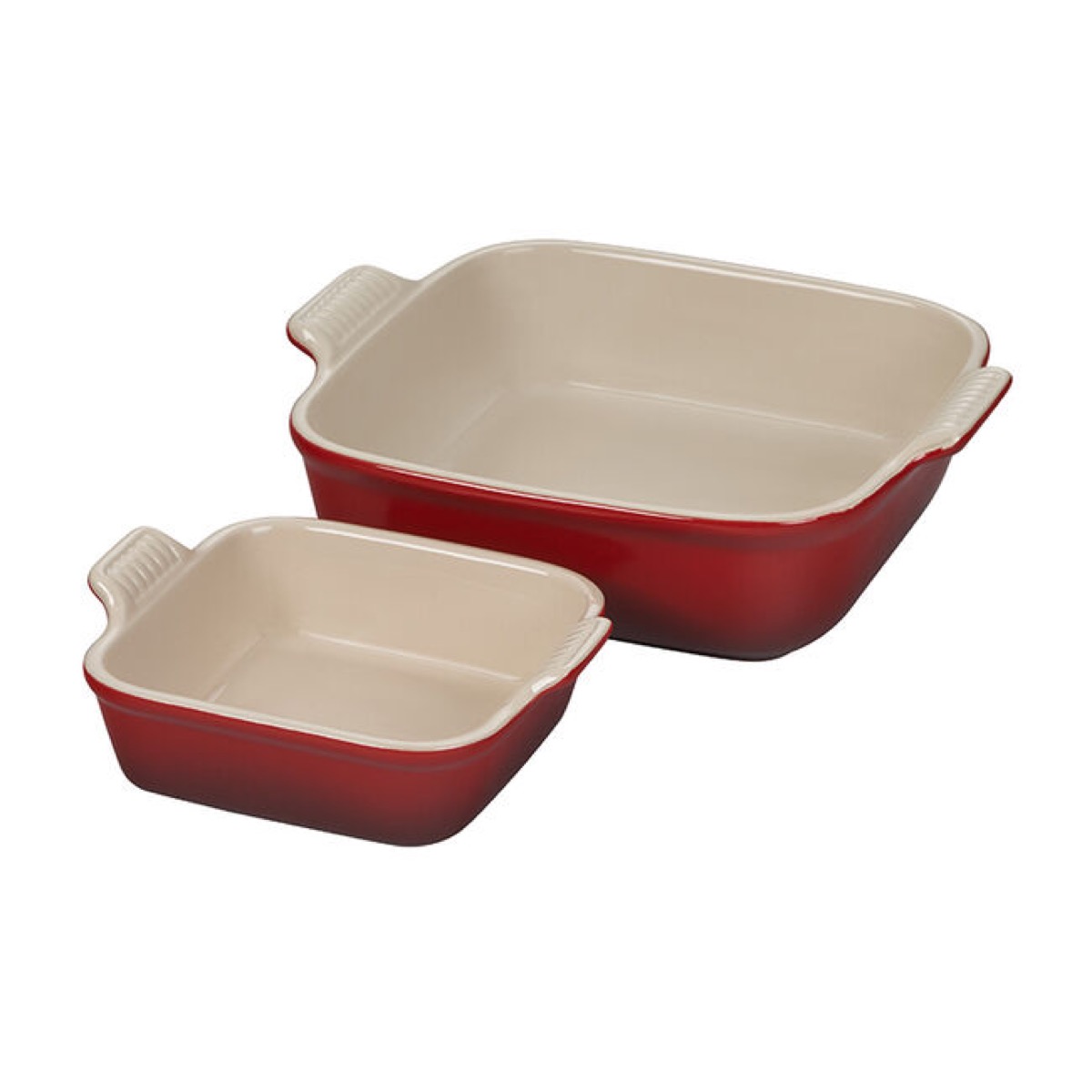 two square red and white ceramic le creuset dishes