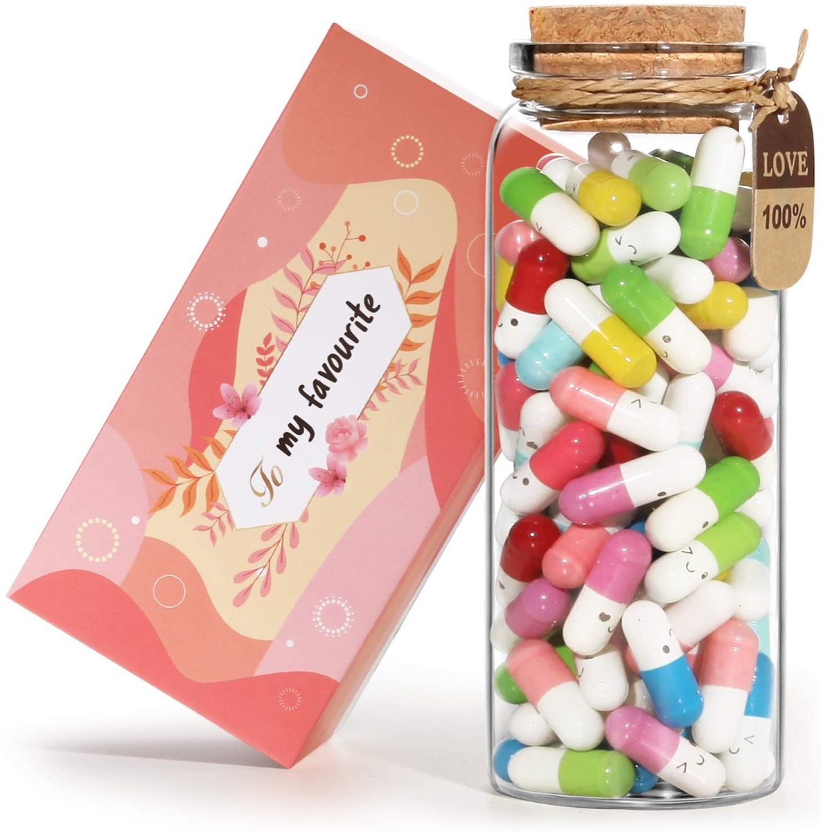 plastic capsules in a bottle next to a card