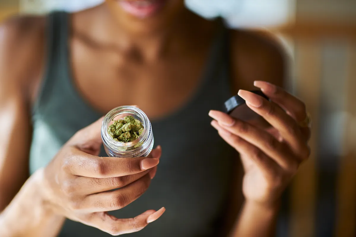 woman holding medical cannabis
