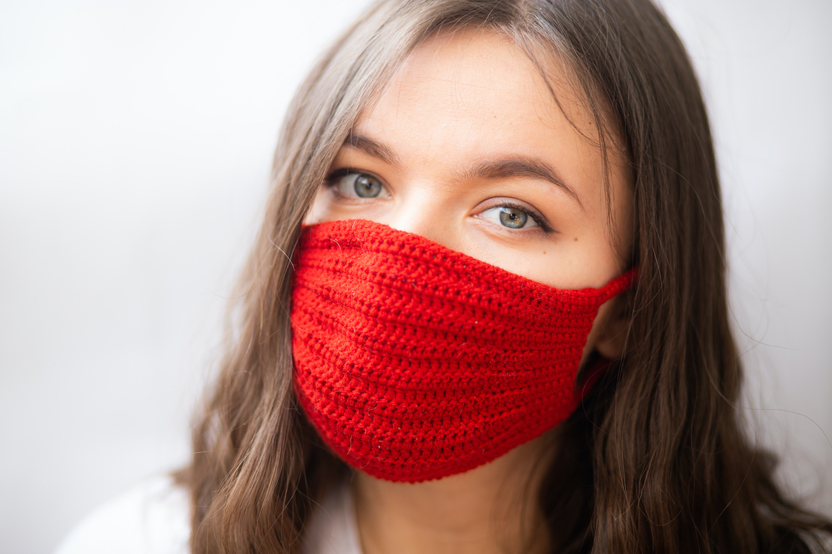 woman wearing red knit mask