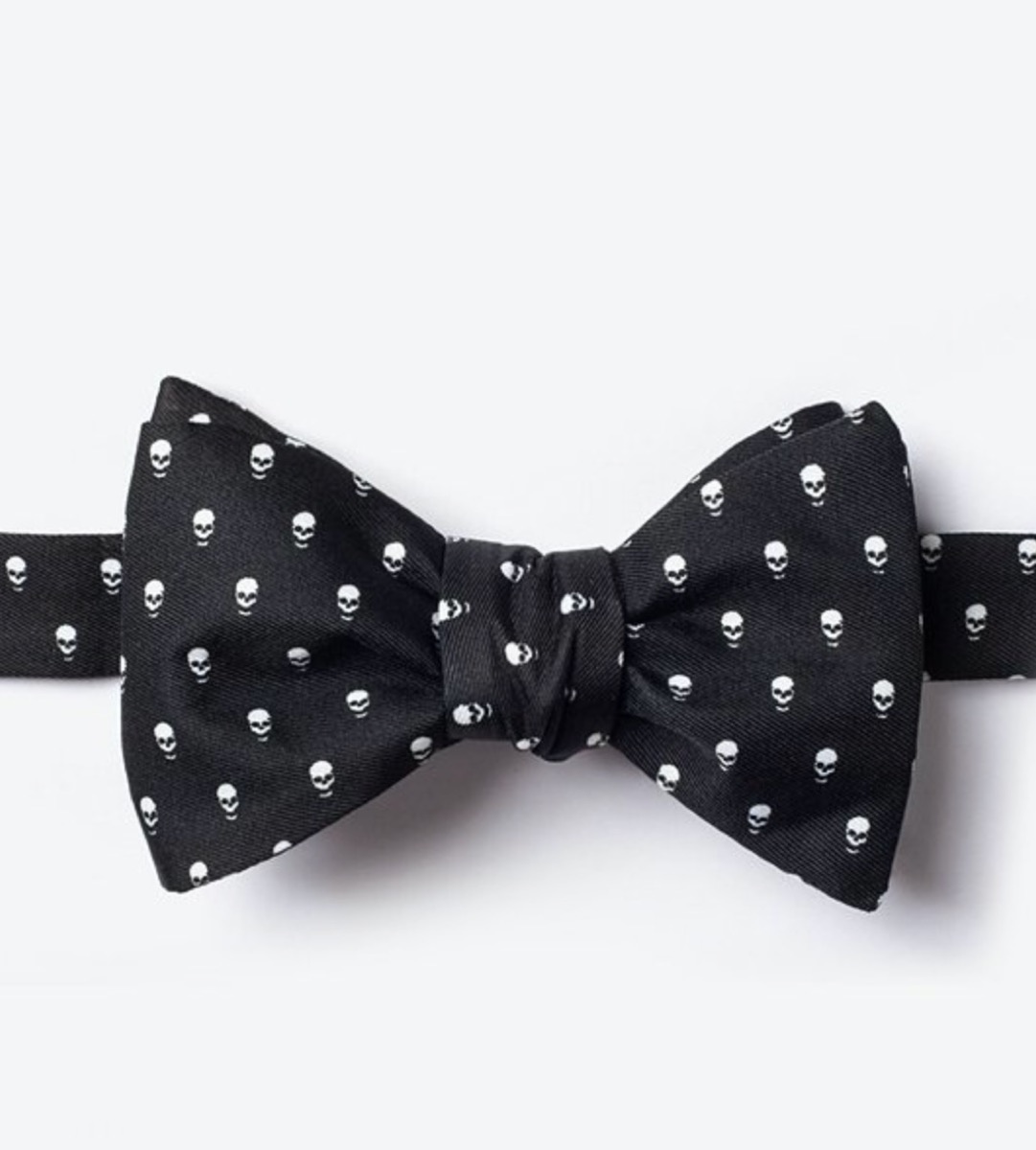 black bow tie with white skills