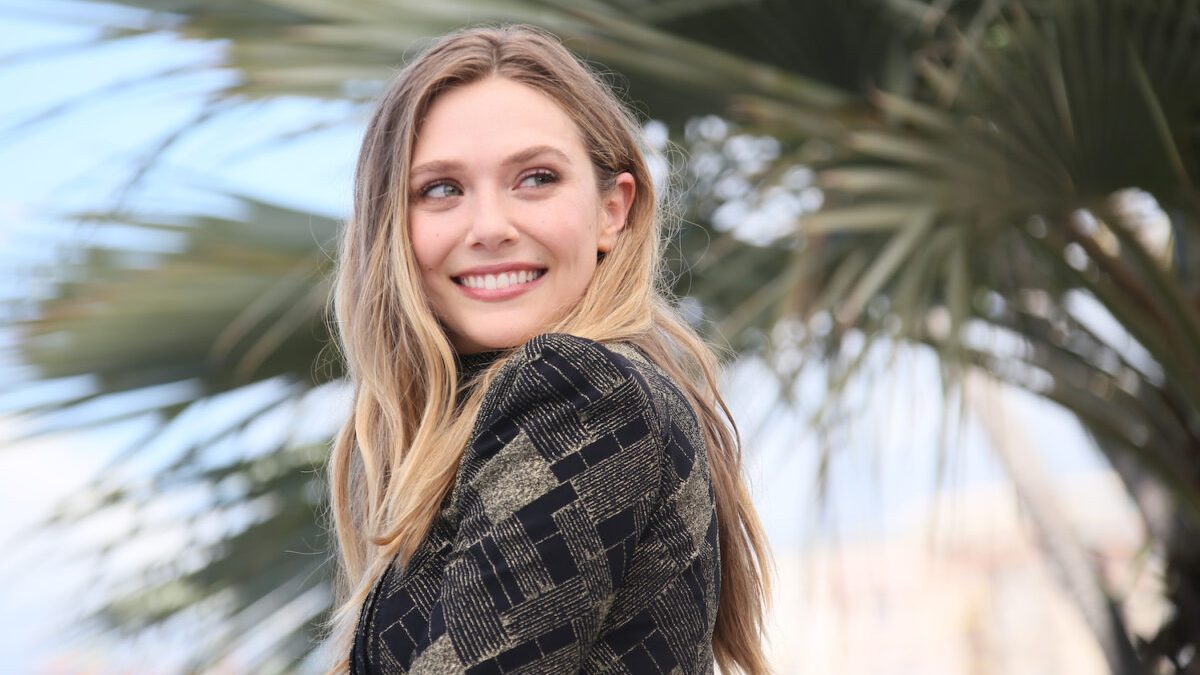 elizabeth olsen dress designed by sisters Elizabeth Olsen wore a dress designed by her older sisters, Mary-Kate and Ashley, to the Emmys