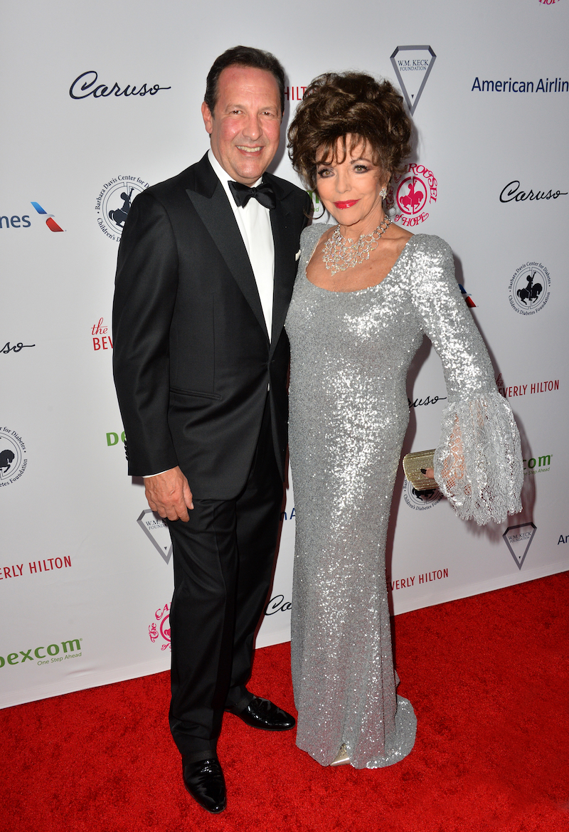  Joan Collins et Percy Gibson 