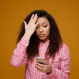 woman frustrated with dating app