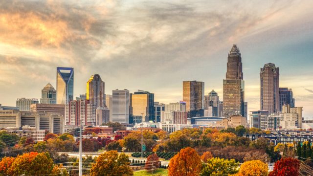 The skyline of Charlotte, North Carolina with fall foliage in the foreground