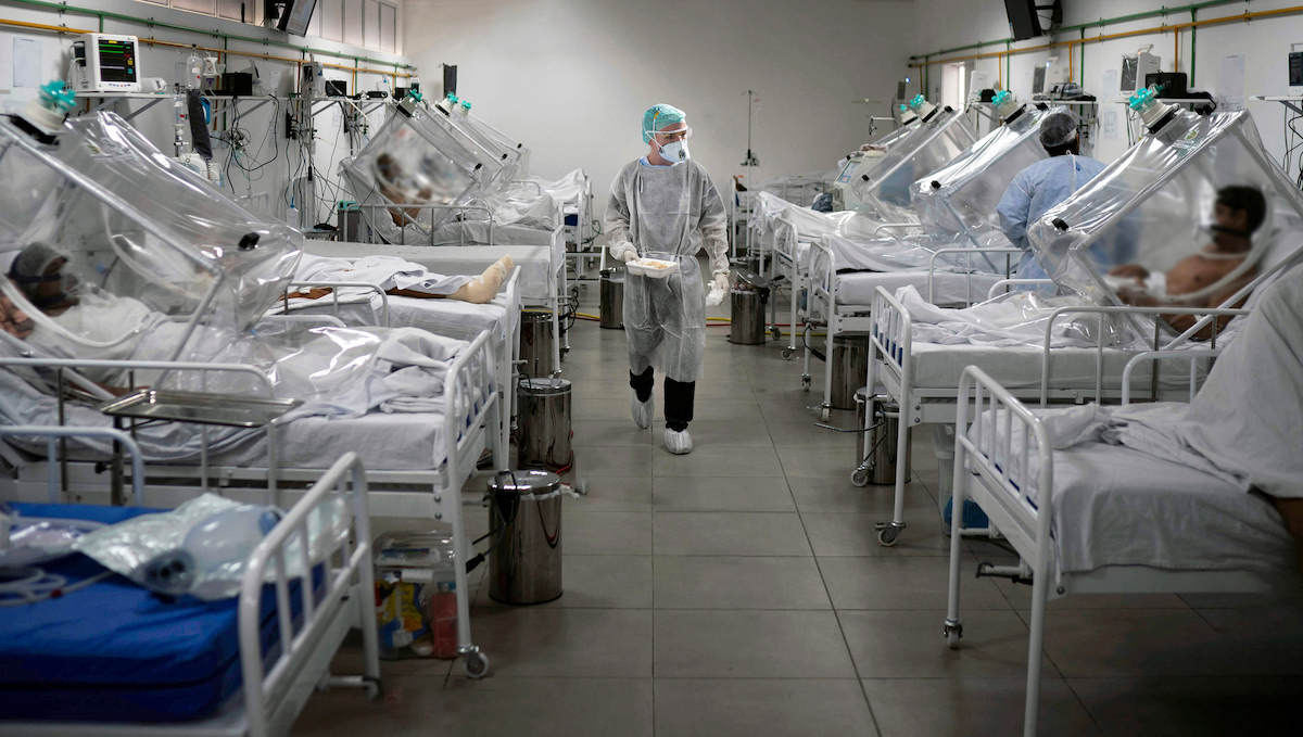 Medical staff work in the Intensive Care Unit (ICU) for COVID-19 multiple patients inside a special hospital in Bergamo, on November 11, 2020.