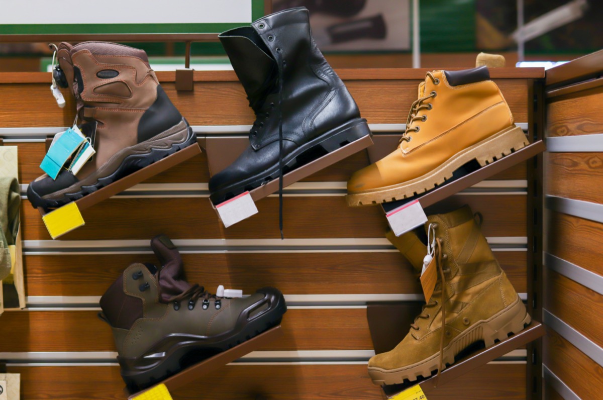 hiking boots on rack in store