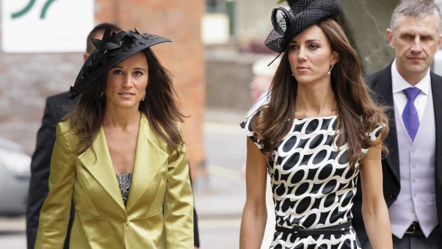 Pippa Middleton and Catherine Duchess of Cambridge attend the wedding of Sam Waley-Cohen and Annabel Ballin at St. Michael and All Angels church on June 11, 2011 in Lambourn, England