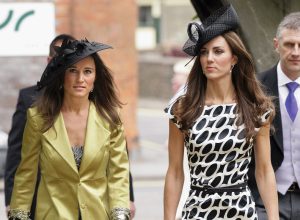 Pippa Middleton and Catherine Duchess of Cambridge attend the wedding of Sam Waley-Cohen and Annabel Ballin at St. Michael and All Angels church on June 11, 2011 in Lambourn, England