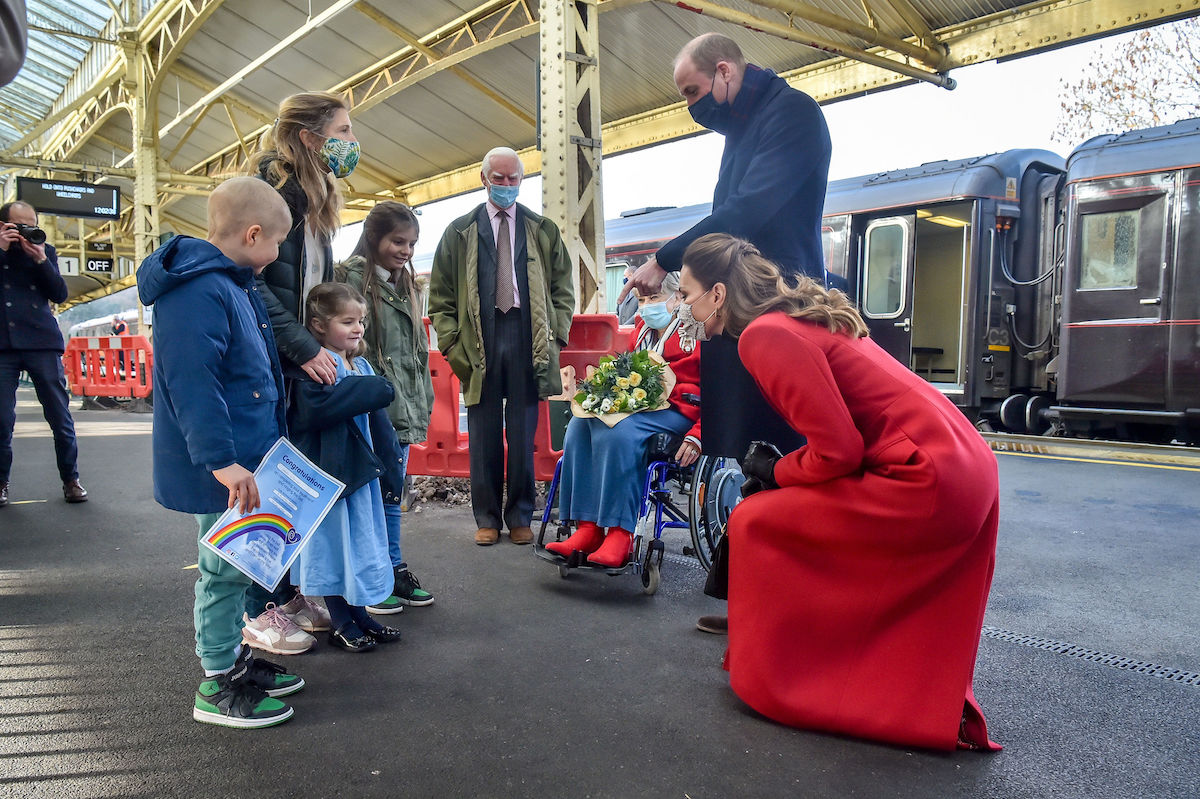 Prince William, Duke of Cambridge and Catherine, Duchess of Cambridge arrive at Bath Spa train station and take time to meet and chat with Jasmine Warner, 5, centre, who's brother Otto, 8, left, has today come out of cancer treatment and was by chance hoping to meet the royal couple with his family, including sister Poppy, 10, right, and mum Georgie, ahead of a visit of the Duke and Duchess to a care home in the city to pay tribute to the efforts of care home staff throughout the COVID-19 pandemic on December 08, 2020 in Bath, England. The Duke and Duchess are undertaking a short tour of the UK ahead of the Christmas holidays to pay tribute to the inspiring work of individuals, organizations and initiatives across the country that have gone above and beyond to support their local communities this year.
