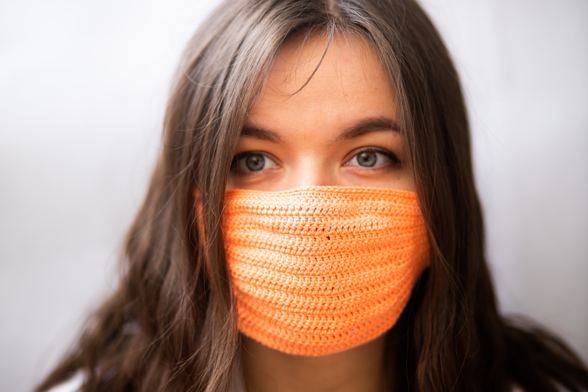 woman wearing a knitted mask
