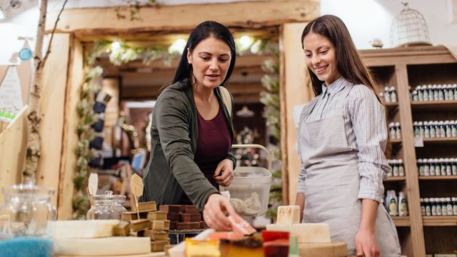 women together in a soap store