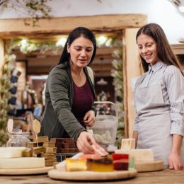 women together in a soap store