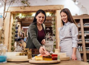 women together in a soap store