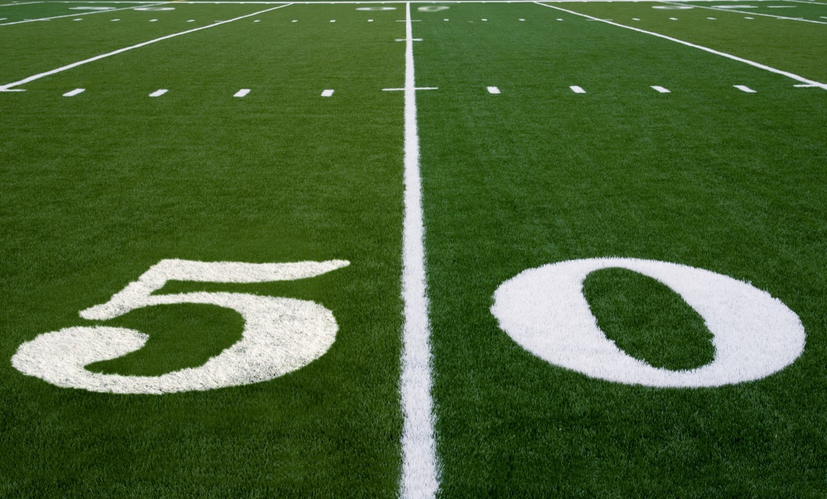 Close-up of 50 yard line on a football field