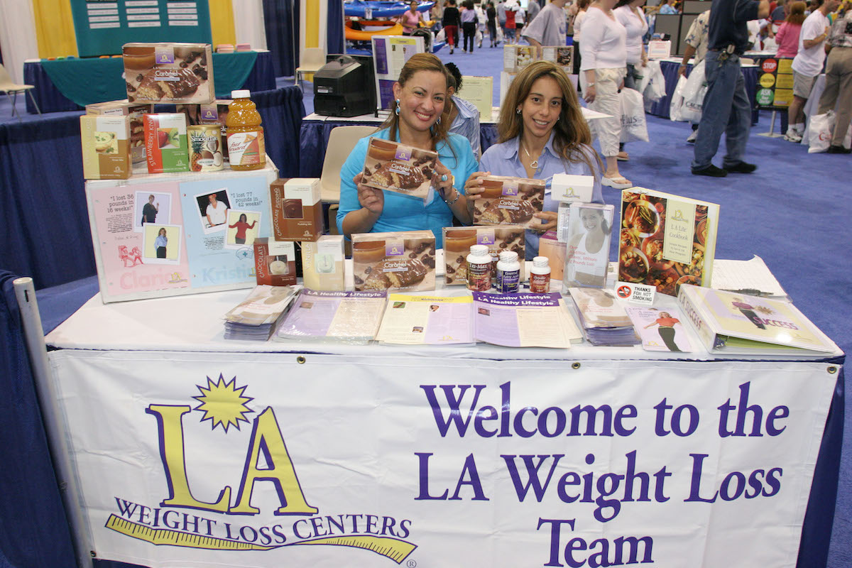 LA Weight Loss Centers table at an expo