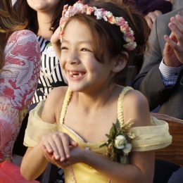 Lily on Modern Family in the episode where Mitch and Cam get married