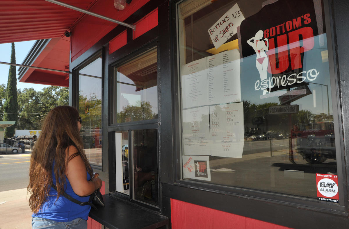 Customer places an order at the Bottoms Up Espresso on Yosemite Blvd., in Modesto, California