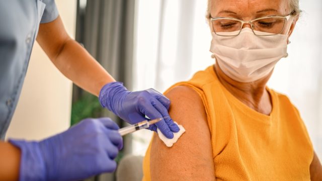 Senior female is about to receive Covid-19 coronavirus vaccine