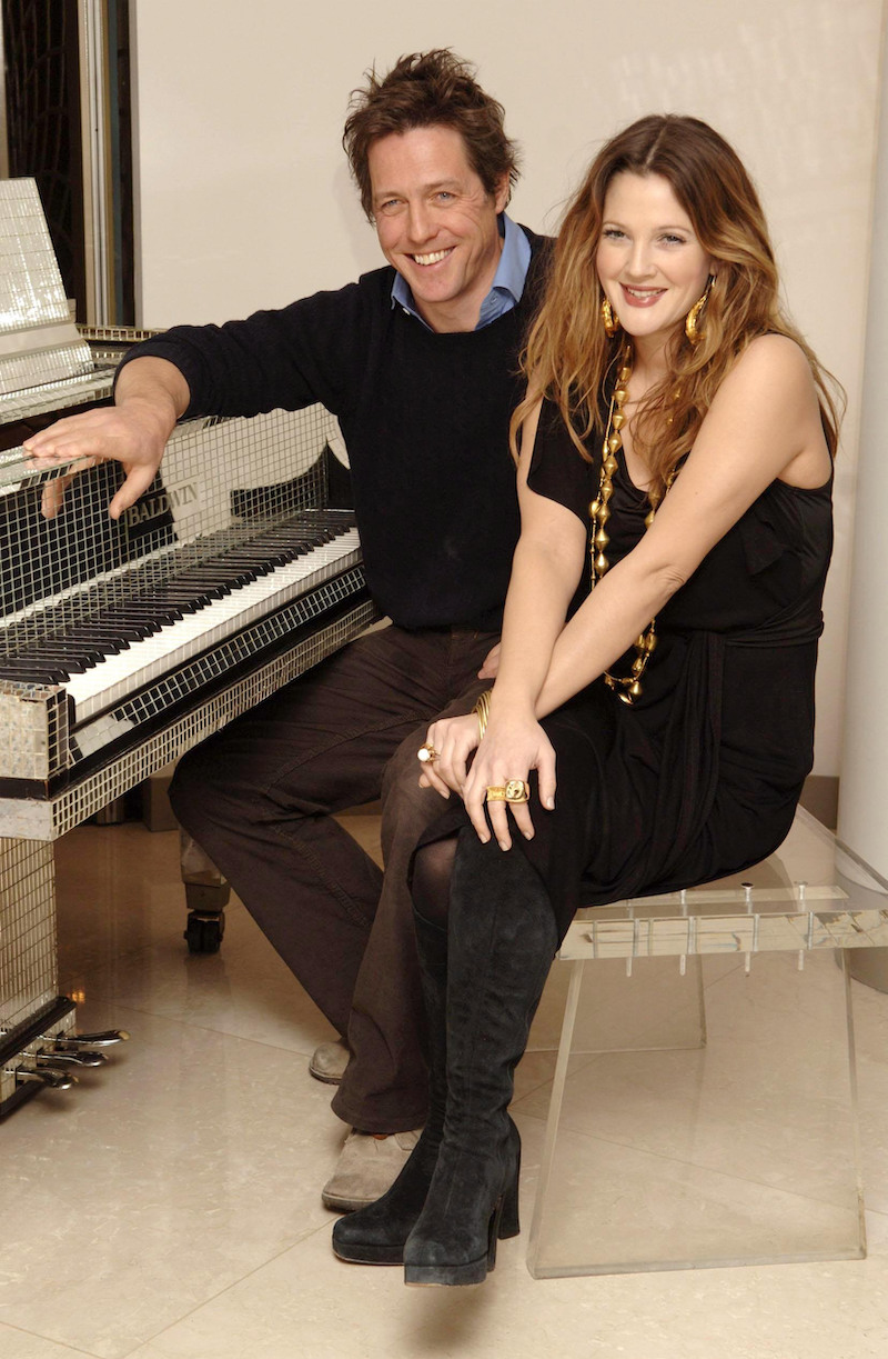 Drew Barrymore and Hugh Grant during a photocall for their new film Music And Lyrics, at the Dorchester Hotel, central London