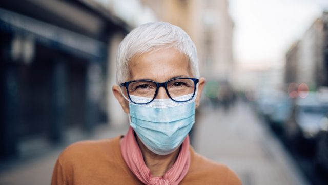 Portrait of a senior woman wearing a protective face mask