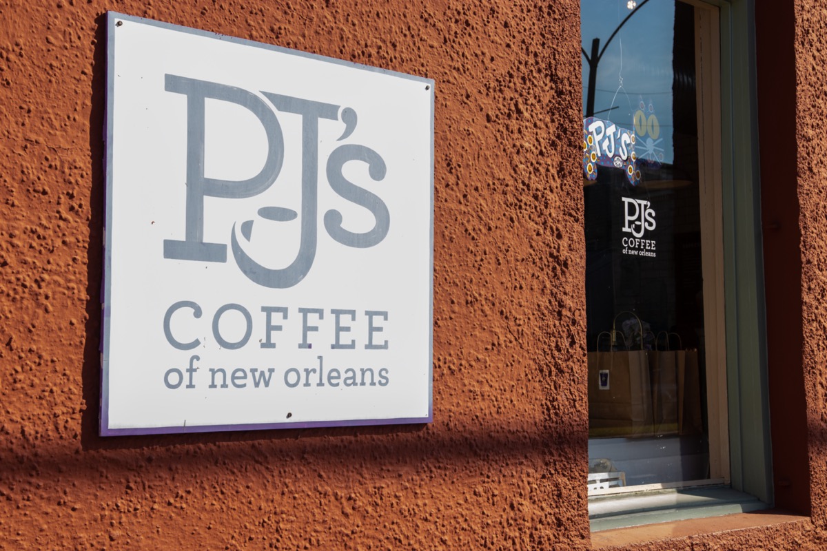 The exterior sign of a PJ's Coffee shop in New Orleans