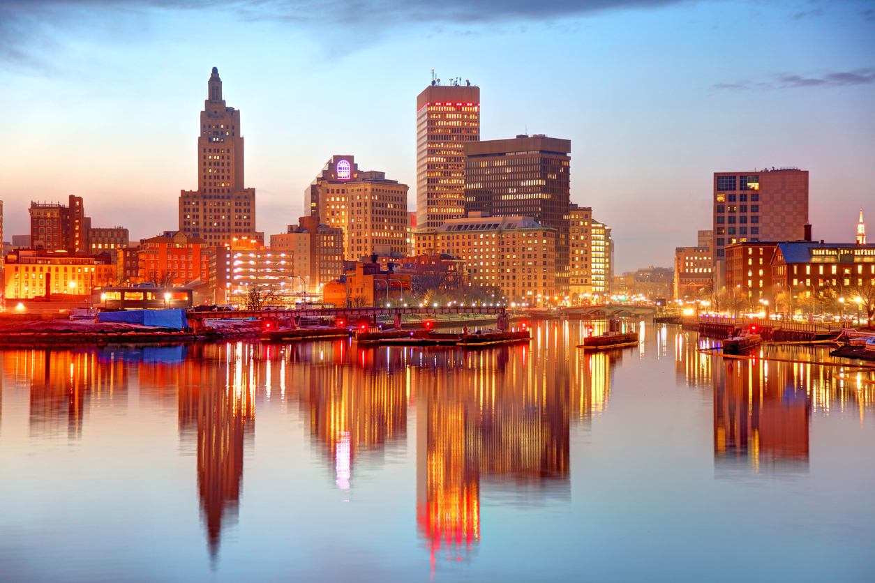 The skyline of Providence, Rhode Island from the water at dusk
